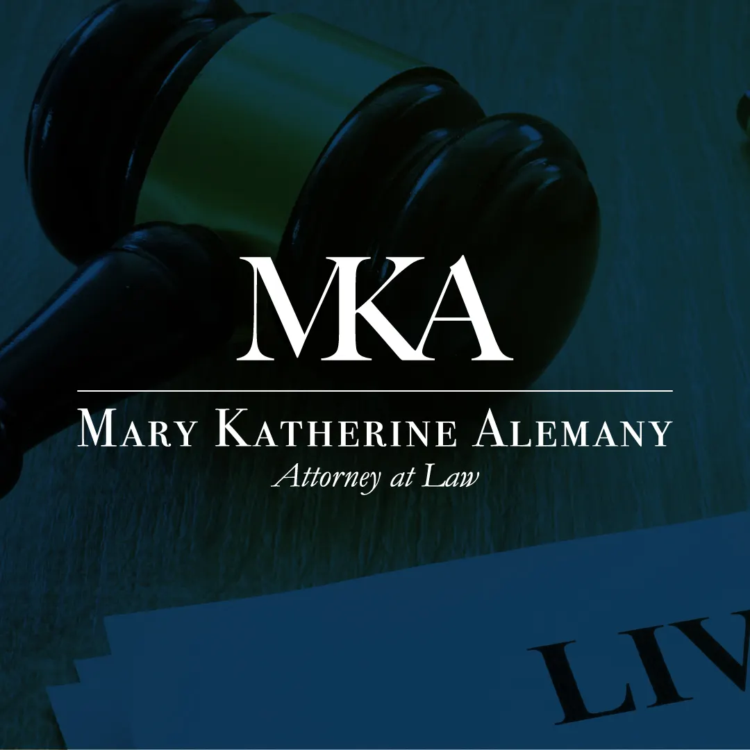 MKA monogram and Mary Katherine Alemany, Attorney at Law wordmark in white serif type over a dark navy photo of a gavel and legal papers